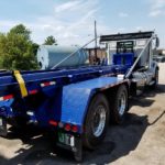 right side photo of the rear end of a made in Canada new JT Fabrication roll off truck body